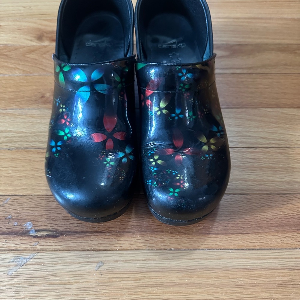 Dansko Black Clogs with Multicolor Floral Design